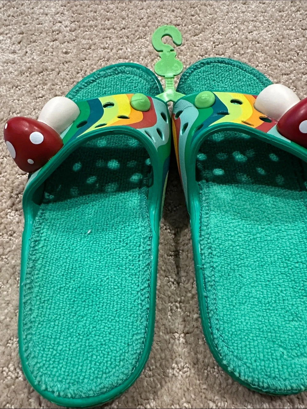 CROCS Teal Slide Sandals with Rainbow Straps and Red Mushroom Charms - Picture 2 of 6